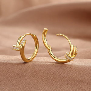 Gold nail stud earring shown from the side with its straight post and back