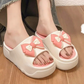 Womens platform slides, white bow platform slide worn