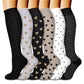 Set of knee high compression socks in botanical and animal print designs