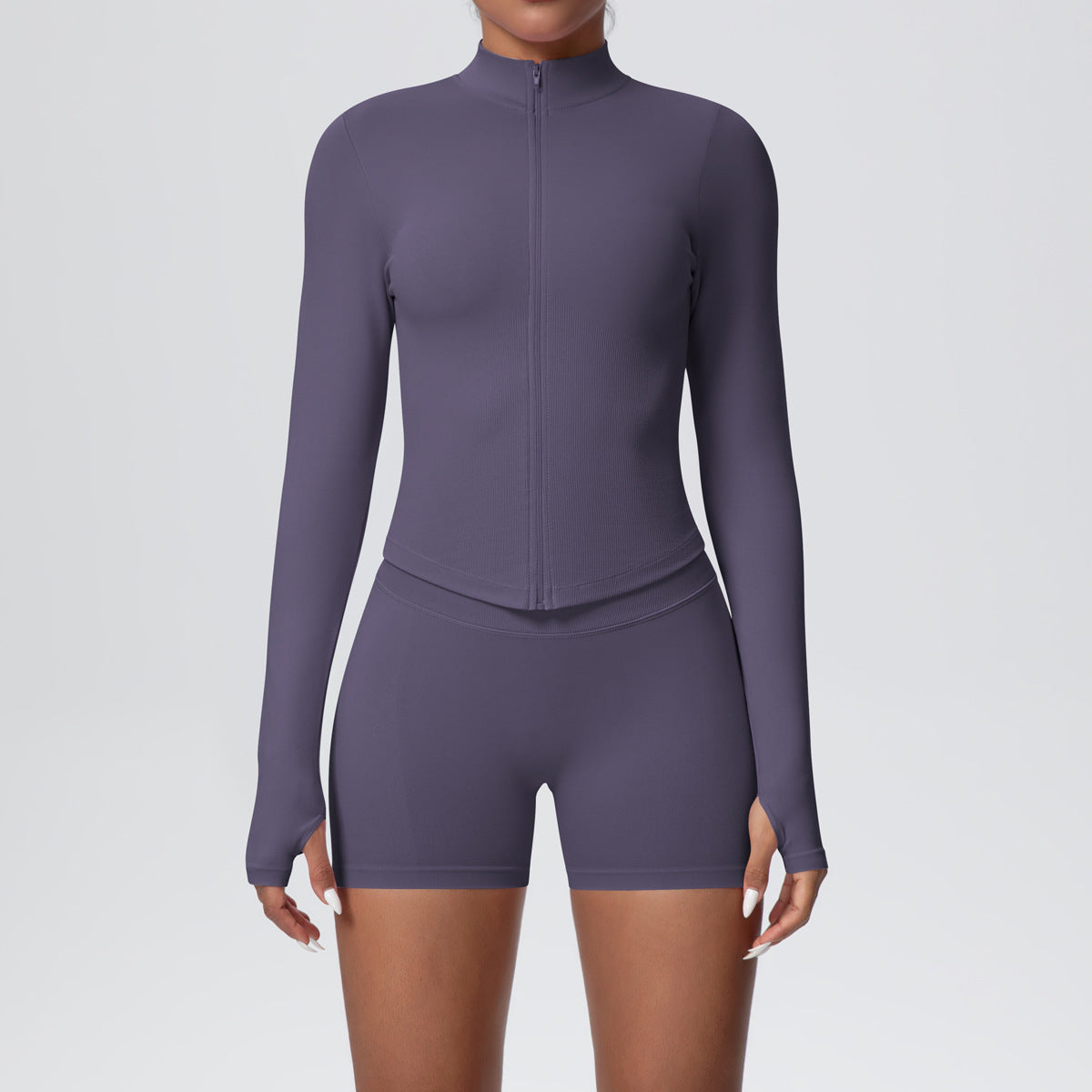 Fitted ribbed seamless zip jacket with a stand collar shown on a female model