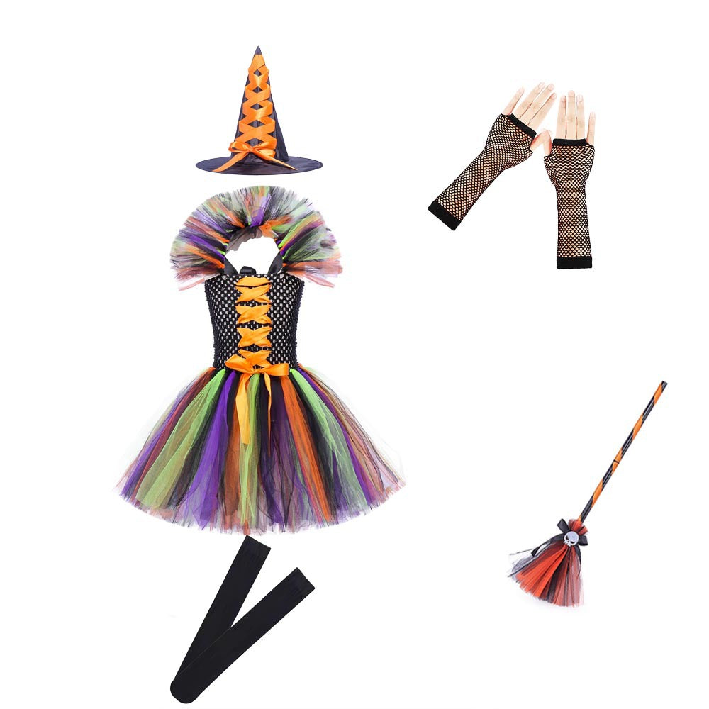 Child modeling the full rose red witch set with hat and broom