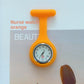 Navy silicone nurse fob watch clipped by a stainless steel brooch pin