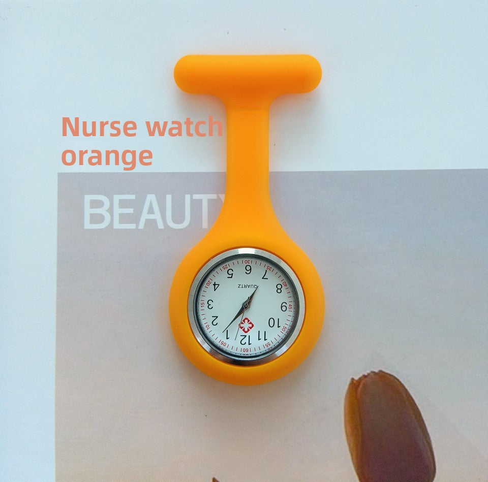 Navy silicone nurse fob watch clipped by a stainless steel brooch pin