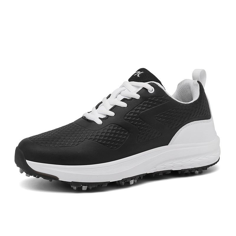 Top-down view of a pair of breathable lace-up golf shoes with mesh detailing