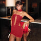 Red backless dress side profile showing the low open back and bare shoulders