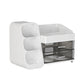 White cosmetic organizer on a white background with a three pocket brush tower and two smoked transparent drawers