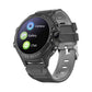 Black kids smart watch with a grey wristband and a home screen with Camera, Gallery and Chat icons