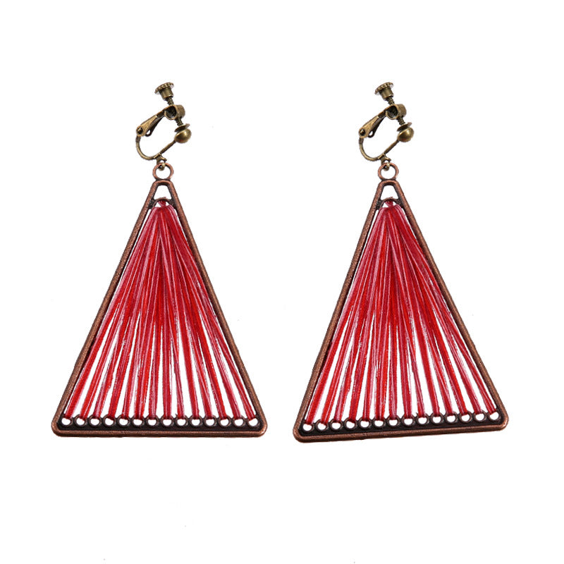 Boho vintage clip-on drop earrings with fringe and bead accents, zinc alloy build, studio image on white background