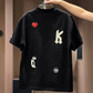 Men's loose fit embroidered patch T-shirt in white with a varsity A letter and sewn on patches