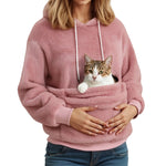 Dusty rose plush fleece hoodie on a model with a cat resting in the large front pocket