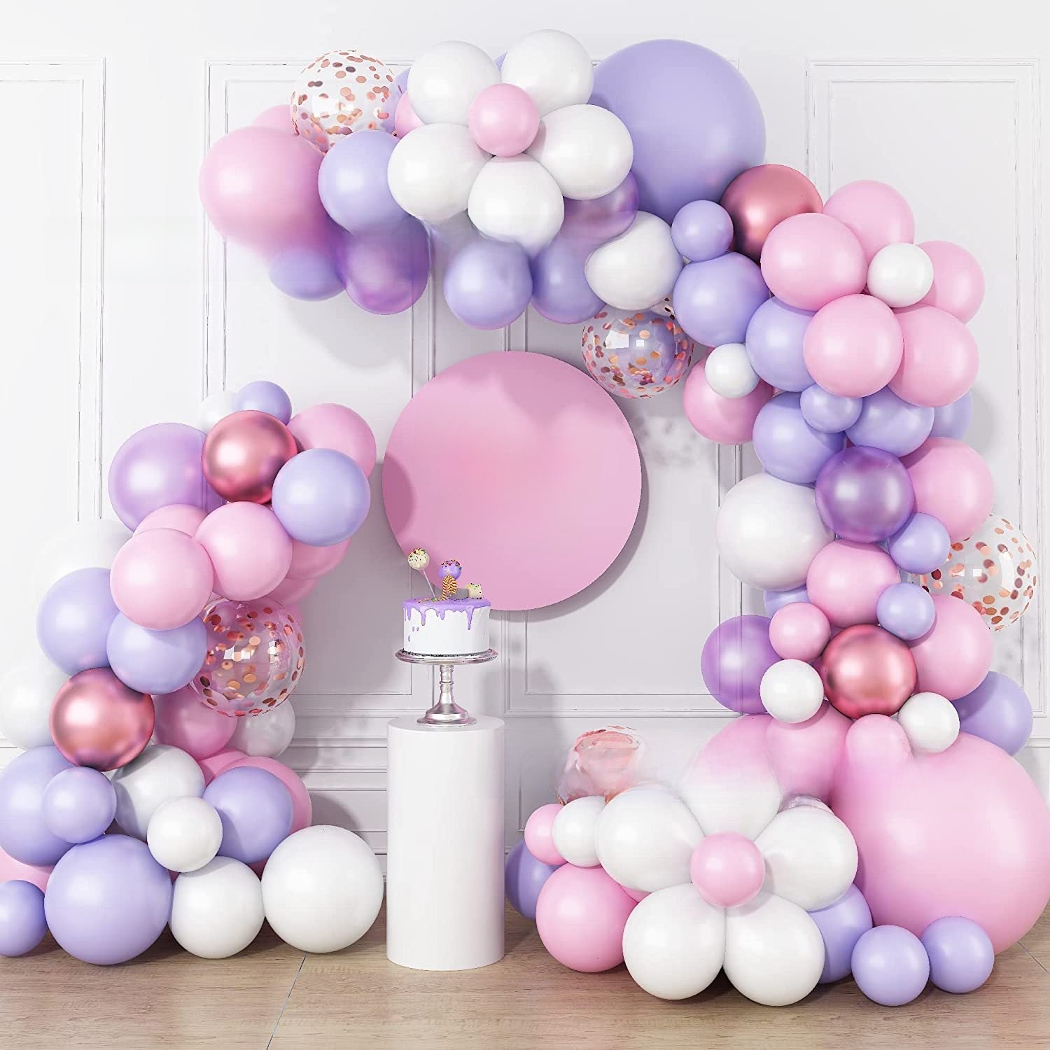 Assembled daisy balloon garland shown beside a chair for scale reference