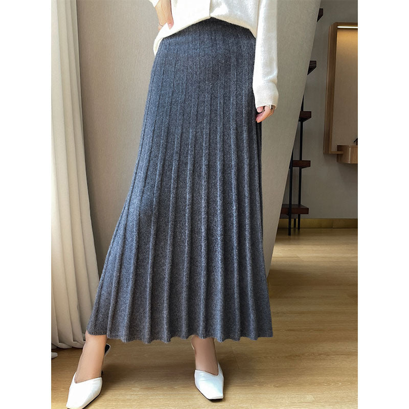 Waist and hip detail of the high waist wool midi skirt
