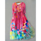 Three quarter sleeve floral art print midi dress with an A line skirt on a hanger