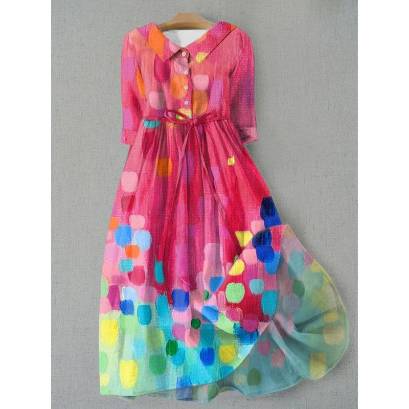 Three quarter sleeve floral art print midi dress with an A line skirt on a hanger