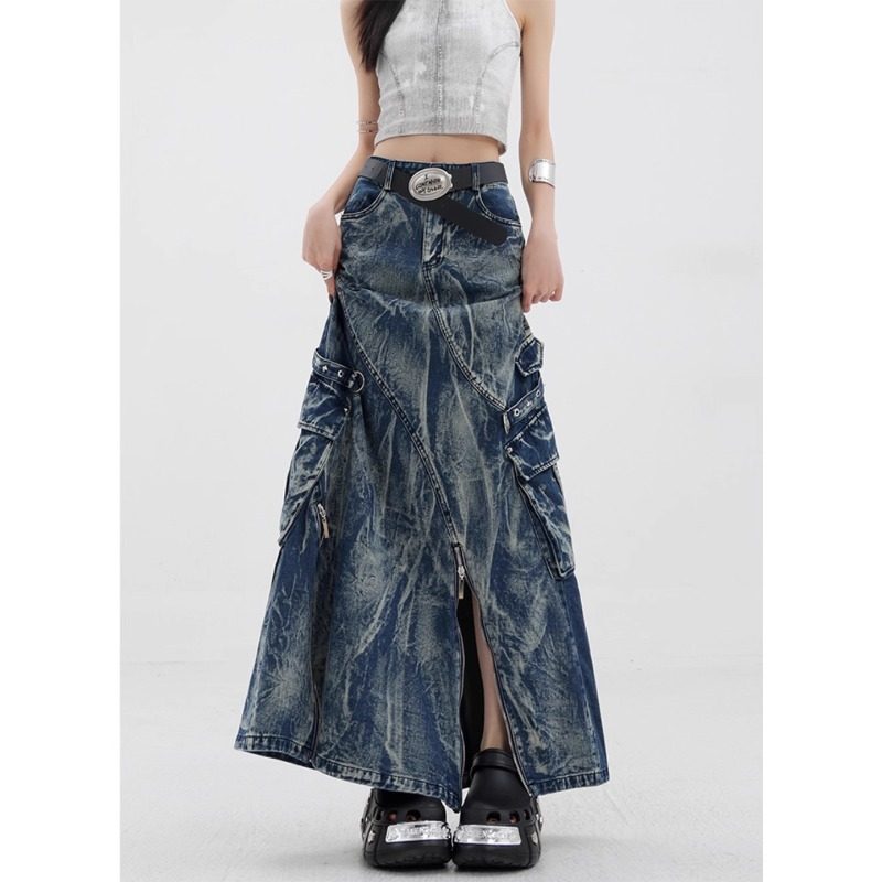 Full length shot of the blue marbled denim maxi skirt styled with chunky black sandals and a cropped top