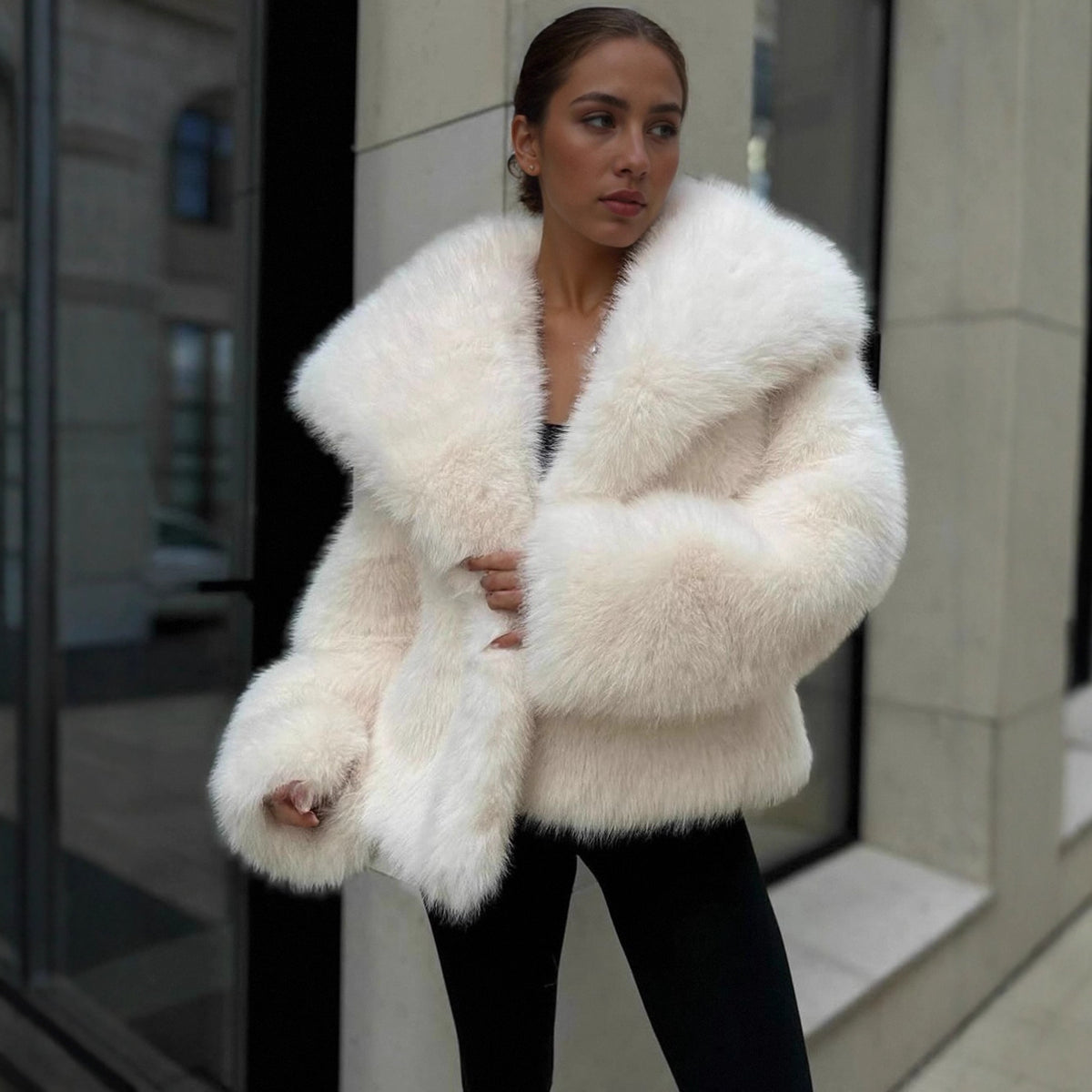 Cream vegan fur lapel jacket on a model with black trousers, option Cream, size M