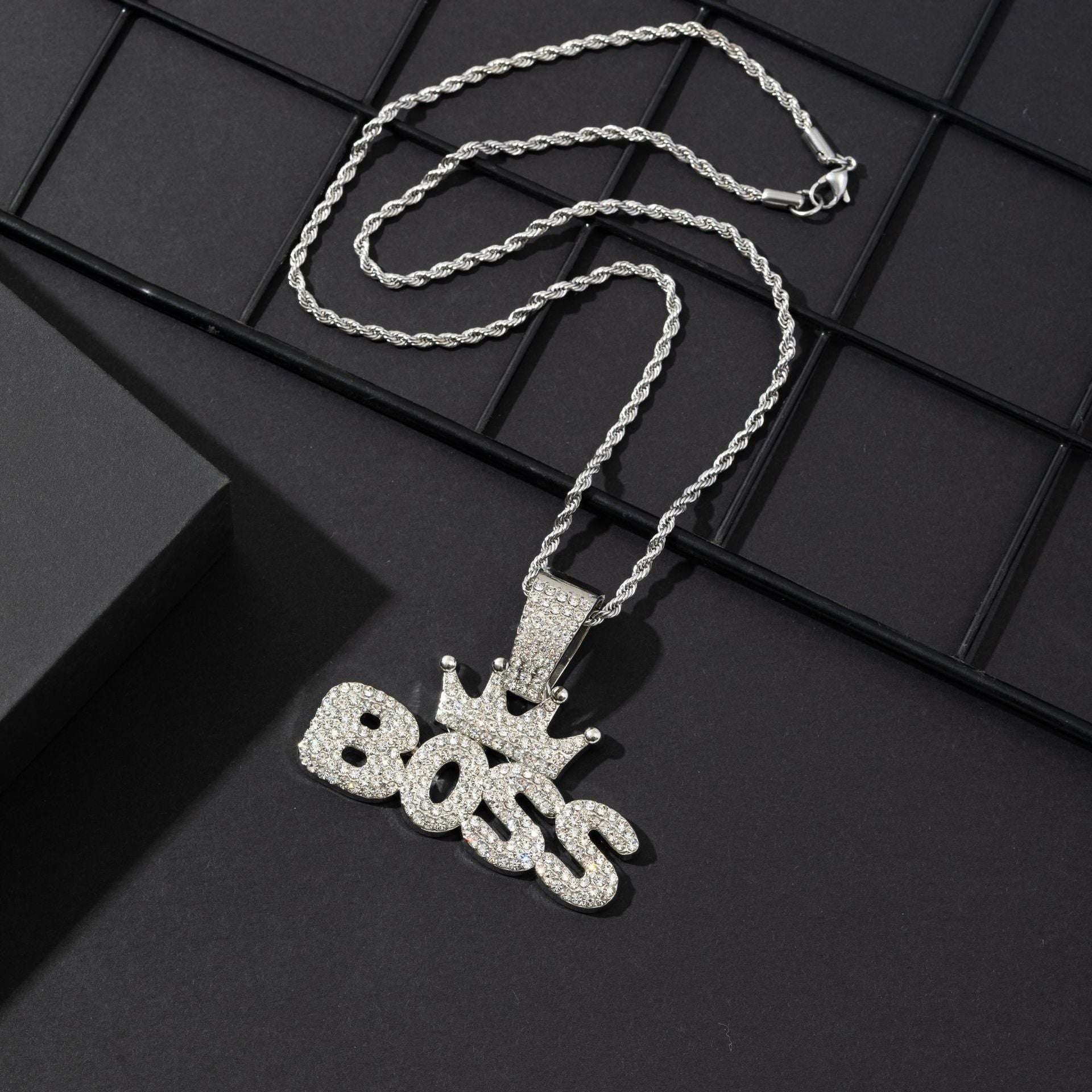Crown pendant necklace shown with chain length reference