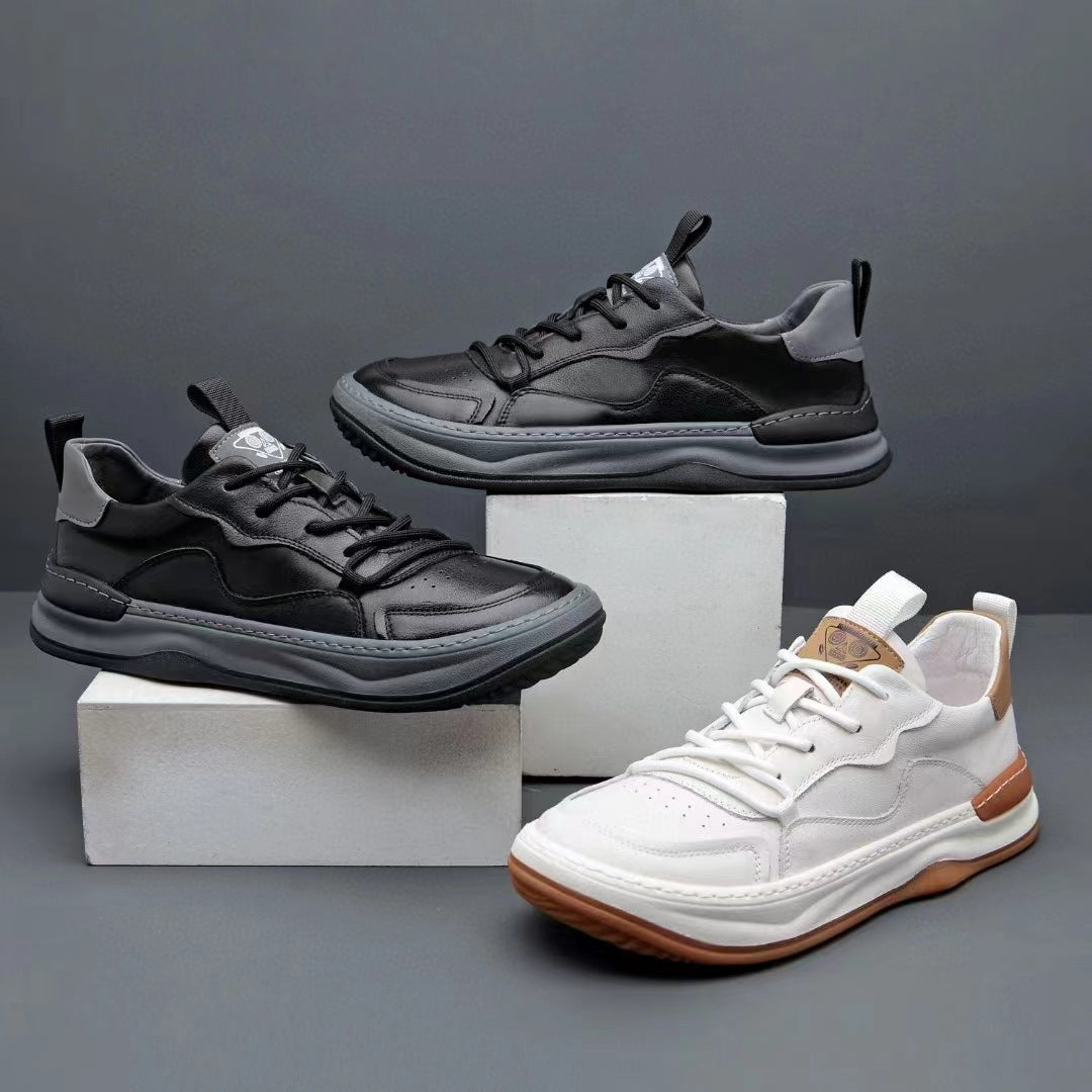 Black and white microfibre sneakers grouped on blocks, low collars and flat laces