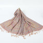 Camel paisley shawl with a pastel border and tan tassels spread on a white background