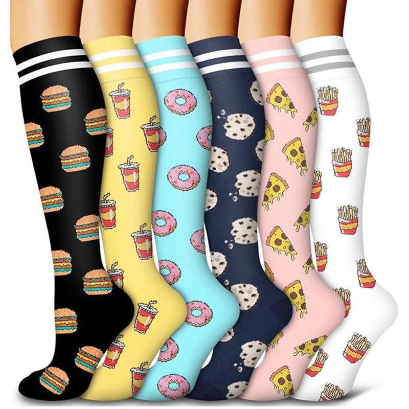 Multi color compression sock set shown flat with reinforced toe and heel zones