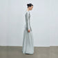 Close up of the soft mint satin fabric and sheen on the evening gown