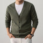 Deep blue green Shangqing V neck button cardigan shown on a model