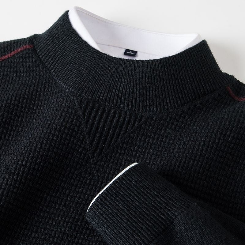 Black men's textured knit half turtleneck long sleeve top, collar and chest insert close-up, size M