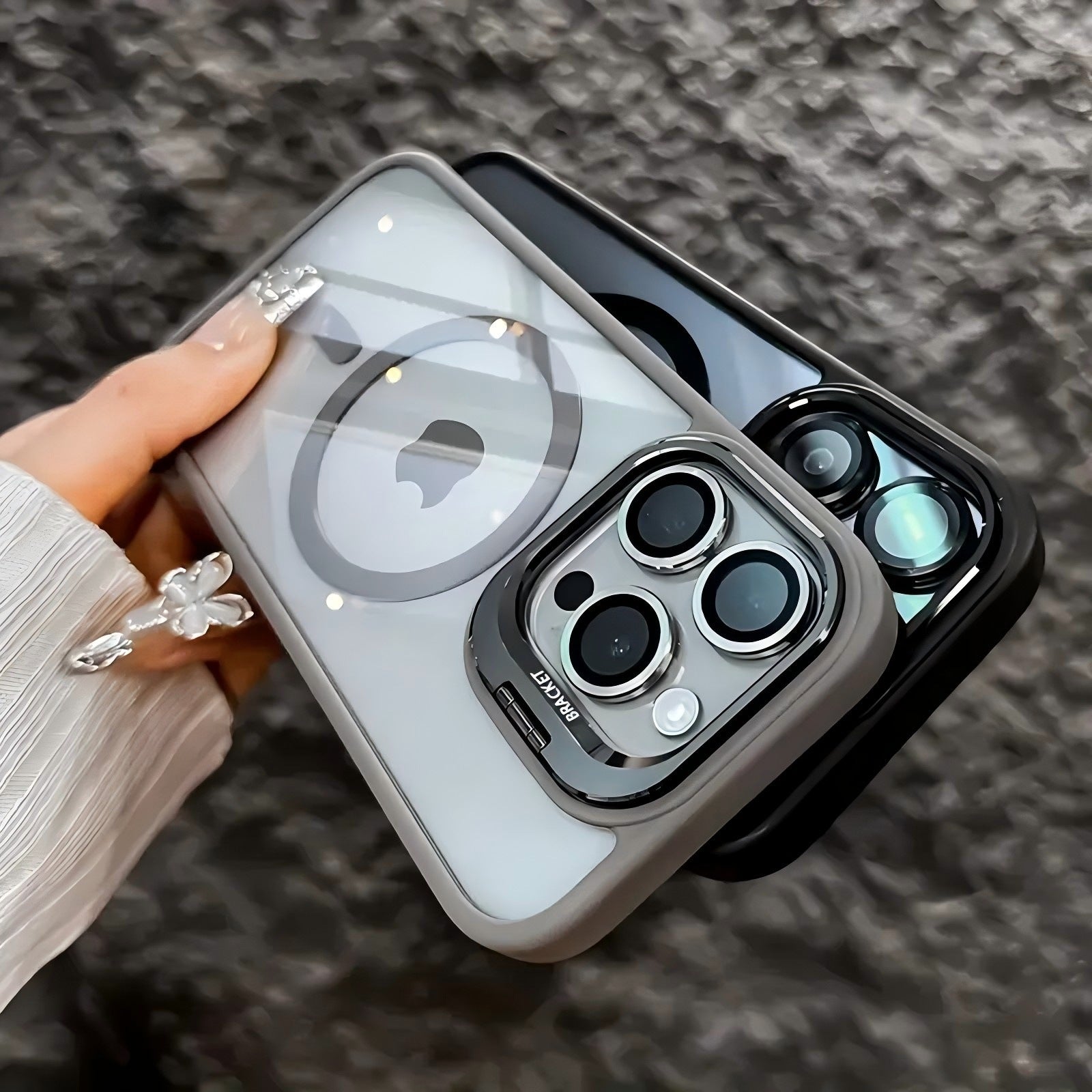 Magnetic protective translucent phone case with a fold out camera stand compatible with iPhone