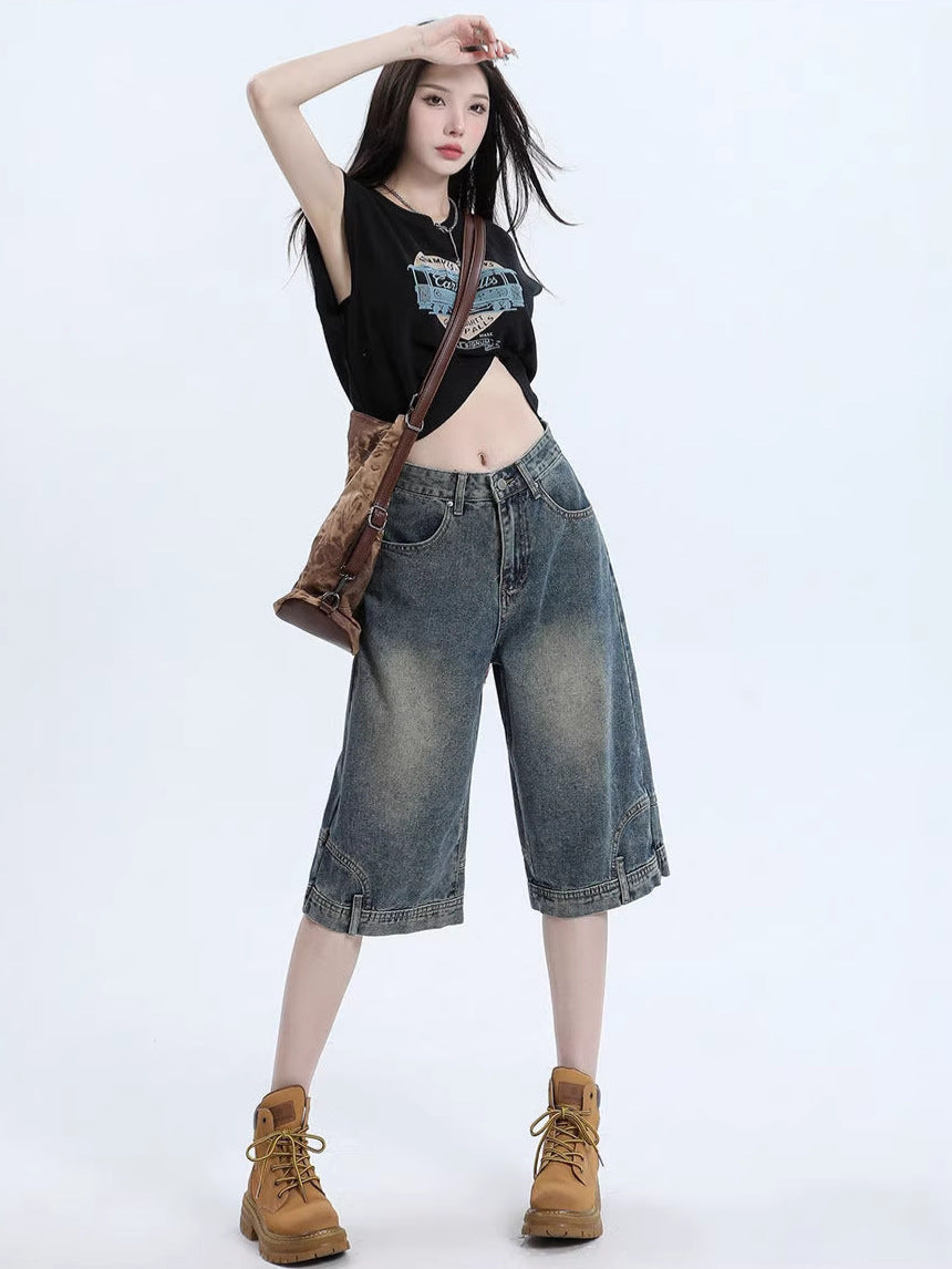 High-waist denim shorts laid flat, full top-down view