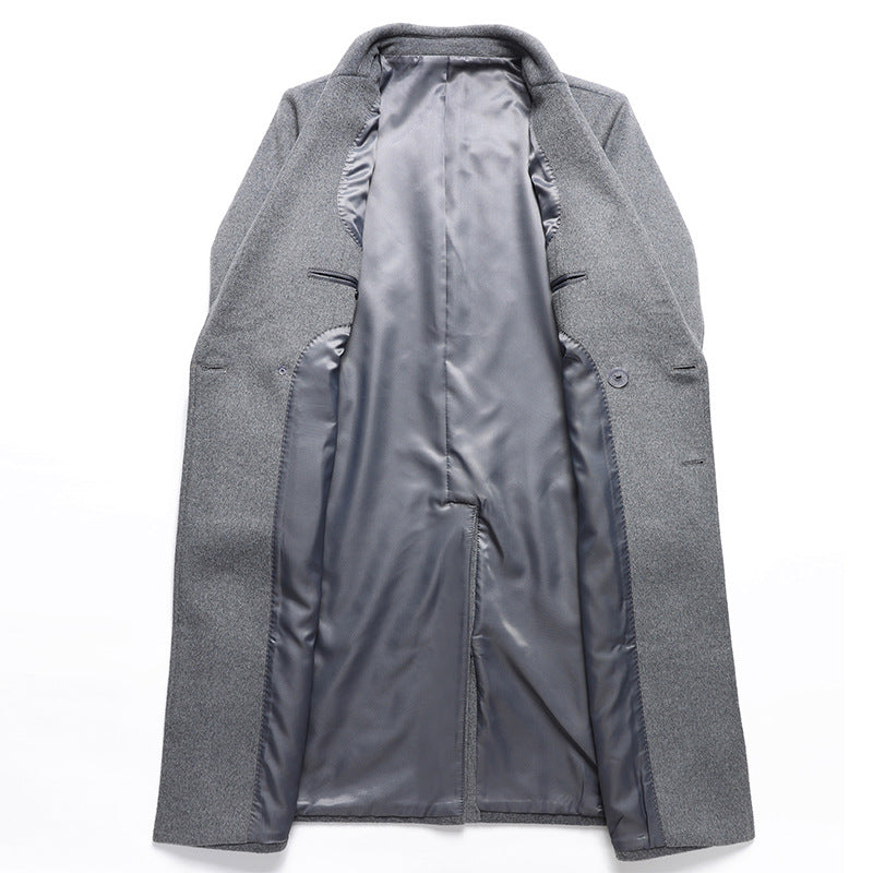 Gray wool blend coat laid open to show the smooth gray lining and the inside of the front