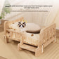 Cat resting on the raised solid wood pet bed in a living room, front three quarter view