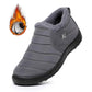 Water repellent coated fabric snow boot with a plush collar and a low molded sole