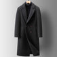 Black double-breasted long coat with peak lapels and down liner option over a dark turtleneck, size 180/XL option