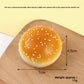 Slow rebound foam squishy bread toy held in hand for scale and feel