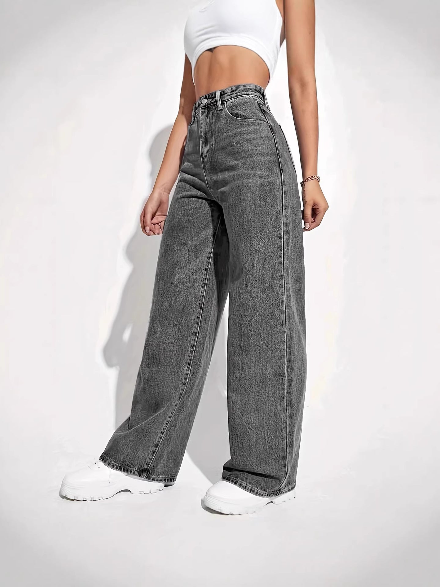 Side profile of straight leg jeans showing clean line from hip to ankle