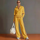 Yellow stand collar sweatshirt with rust contrast trim and matching wide leg drawstring pants