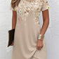 Relaxed floral print short sleeve dress showing the straight easy body and print