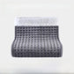 Gray quilted electric foot warmer with a white plush cuff on a pale background, EU plug option