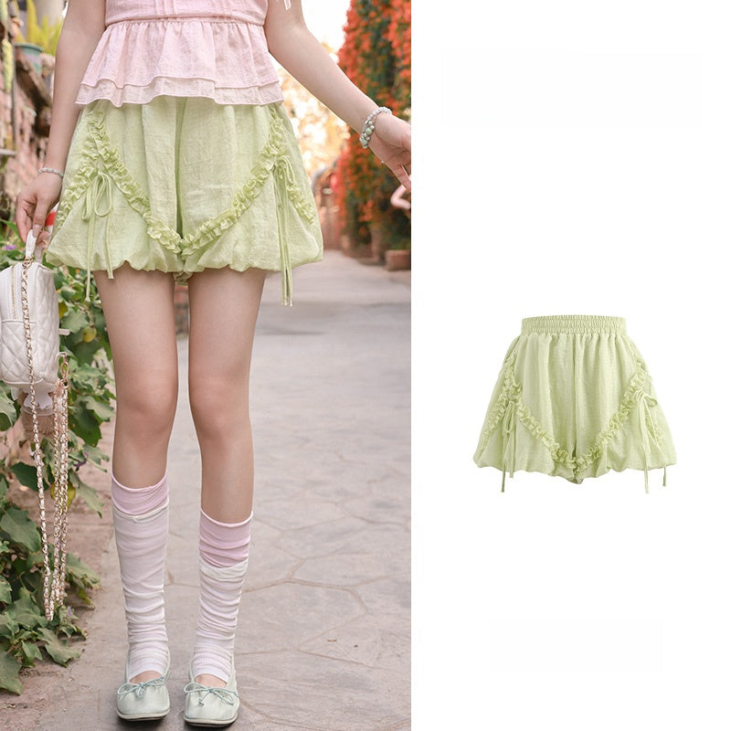 Full floral sleeveless top and shorts set on a clean studio background