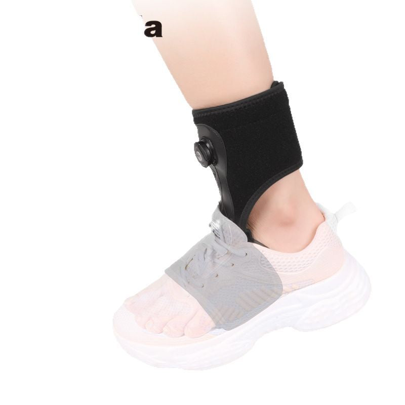 Black ankle foot orthosis worn on a foot inside a white trainer, side view