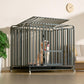 Iron dog crate shown packed flat with the frame panels and tray before assembly on the floor
