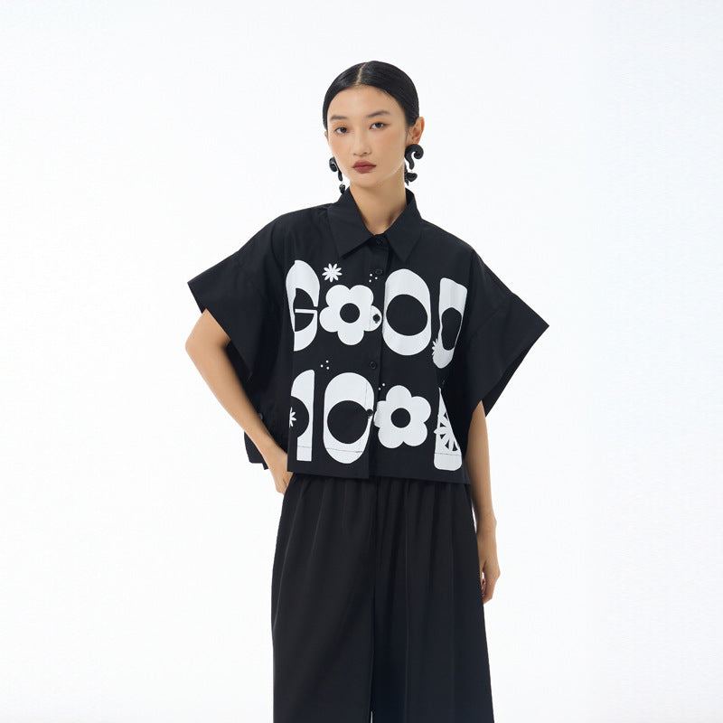 Black cropped button up shirt with white Good Mood print and batwing short sleeves