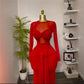 Red long sleeve maxi dress on a gold head mannequin showing the twisted bust and hip drape