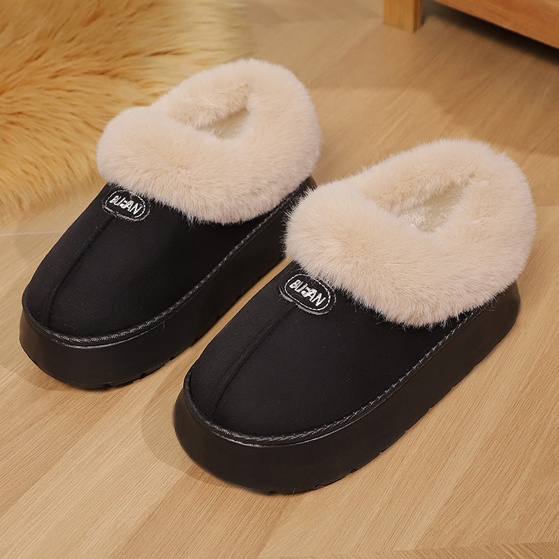 Soft fleece lined slip on slipper shown on a wooden floor for a cozy home look
