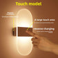 LED wall sconce giving ambient light up a staircase wall