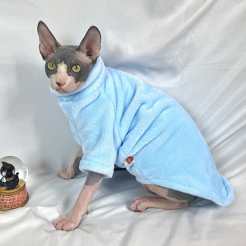 Sphynx cat wearing a soft mink velvet turtleneck sweater in taupe brown