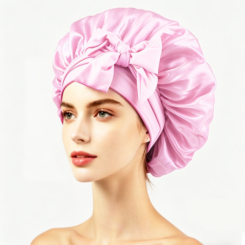 Smooth satin sleep bonnet with long ties, roomy enough for curls or braids