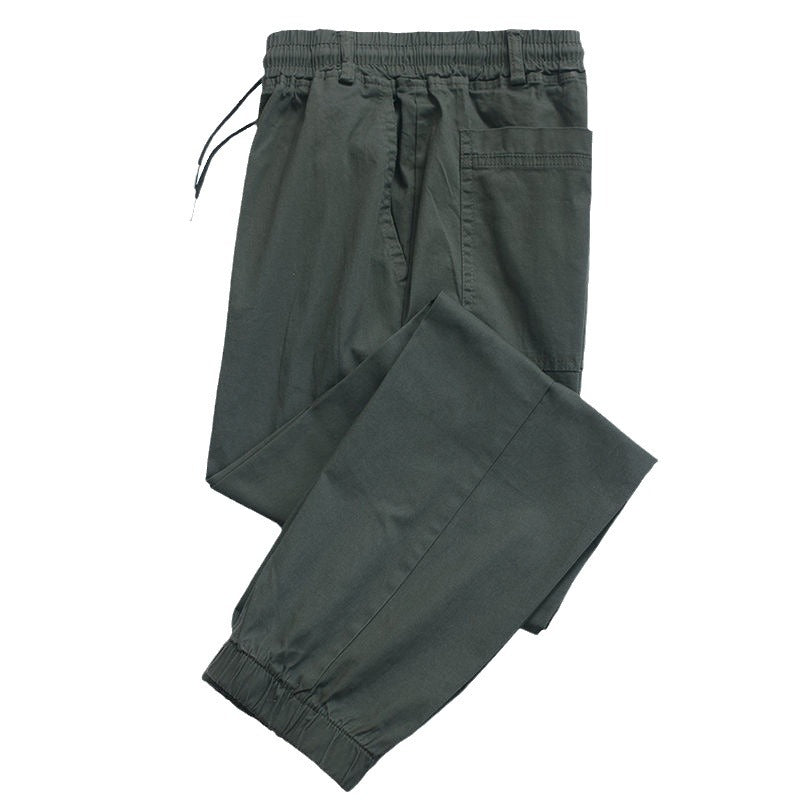 Mens loose fit camo cargo joggers with elastic ankle cuffs shown on a plain background