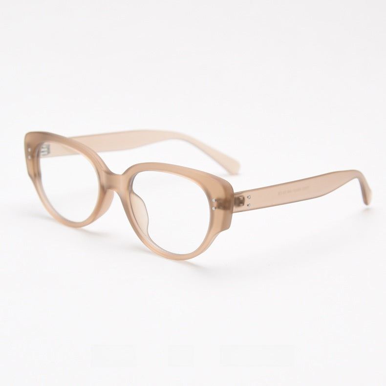 Frosted coffee translucent oval cat eye frame with clear lenses at an angle