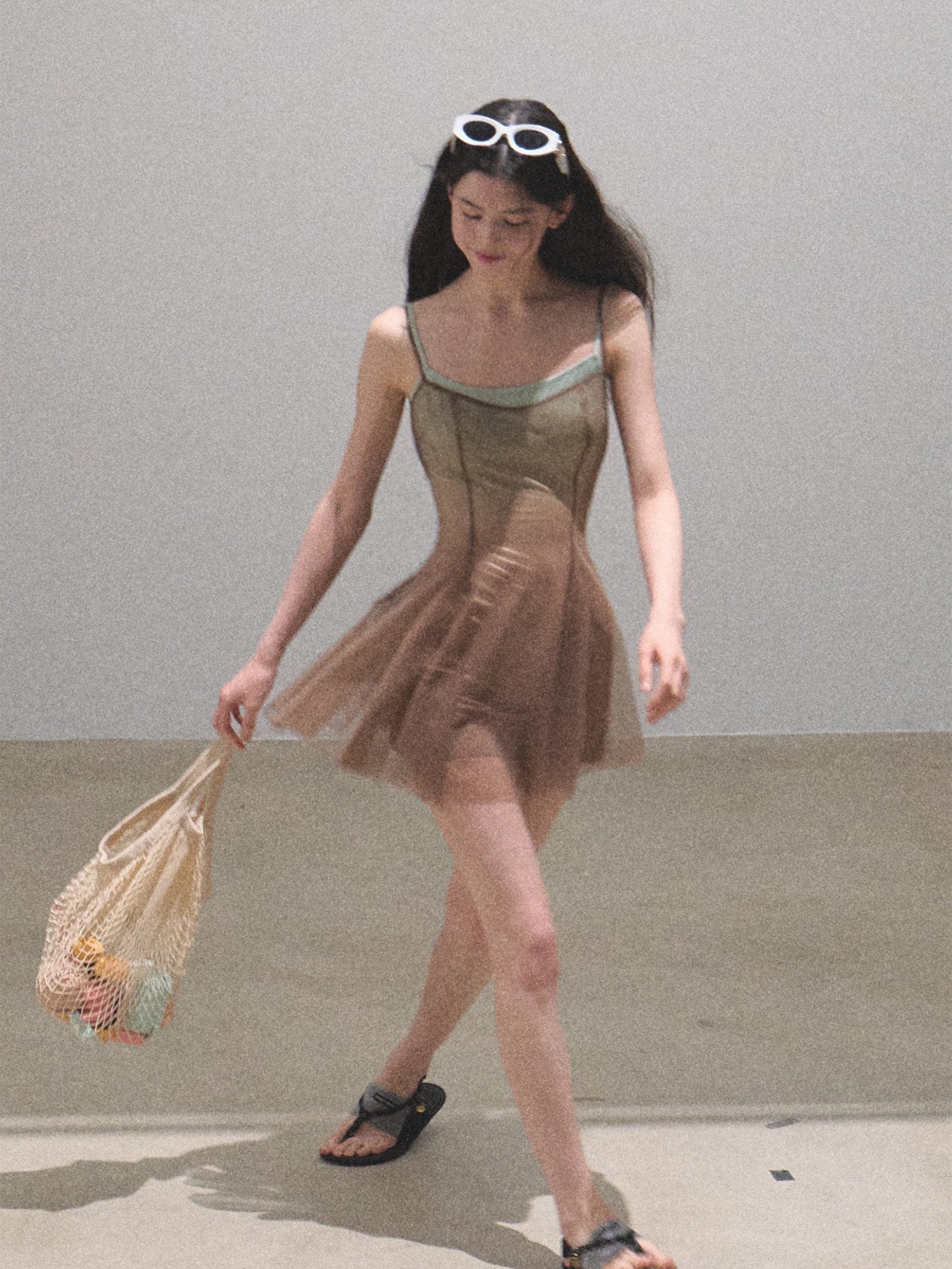 Mid dance shot with the mesh stretching on the move